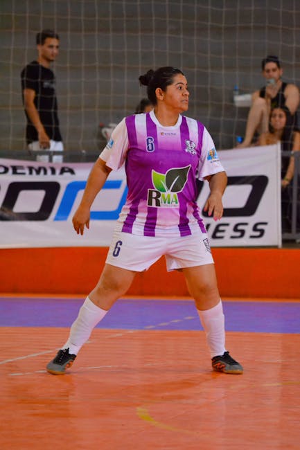 Futsal player jersey number 6 representing tiered performance